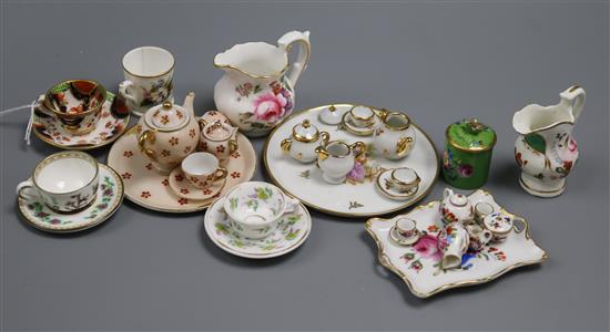 A group of miniature china including teasets, cup and saucers, jugs, etc.